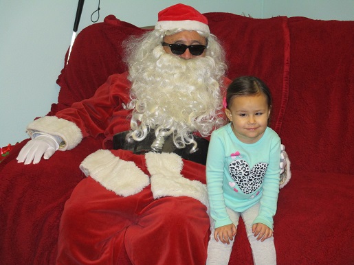 Blind Santa with a small child